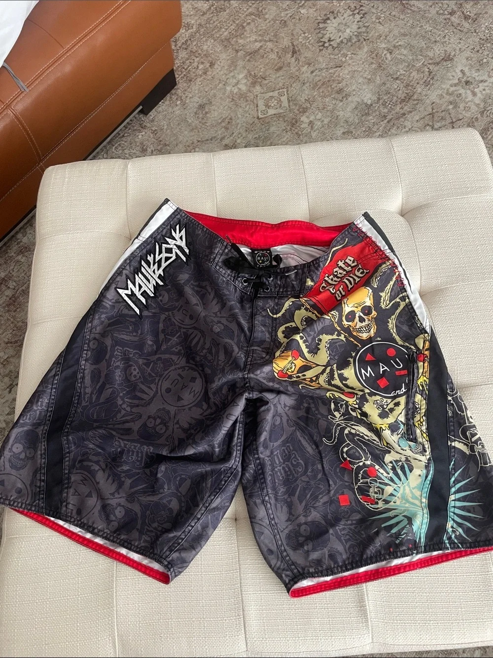Maui and Sons Black Swim Shorts with Red & Yellow Skull Graphic
